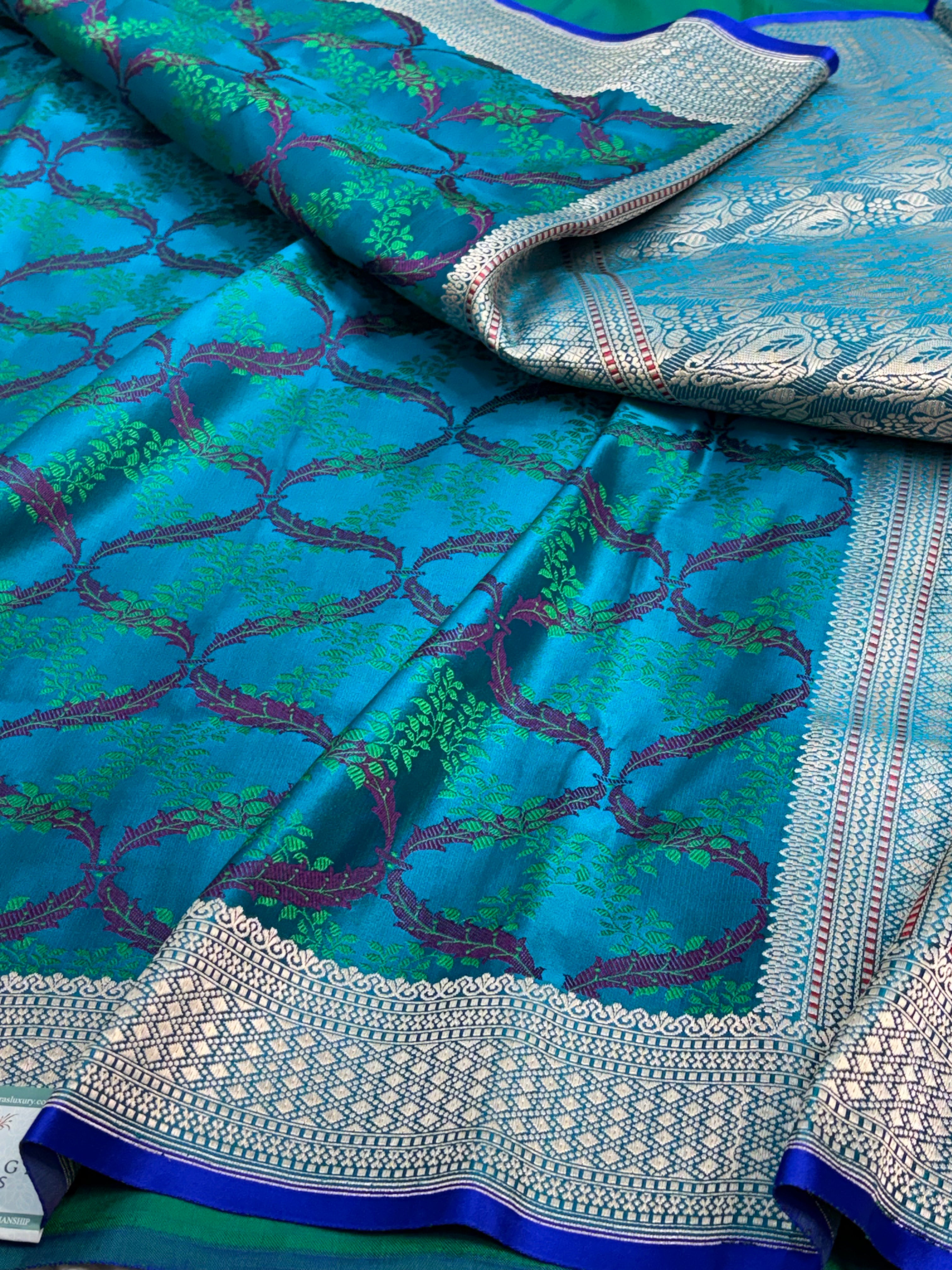 Turquoise Blue Pure Satin Silk Tanchoi Banarasi Saree with Floral Design