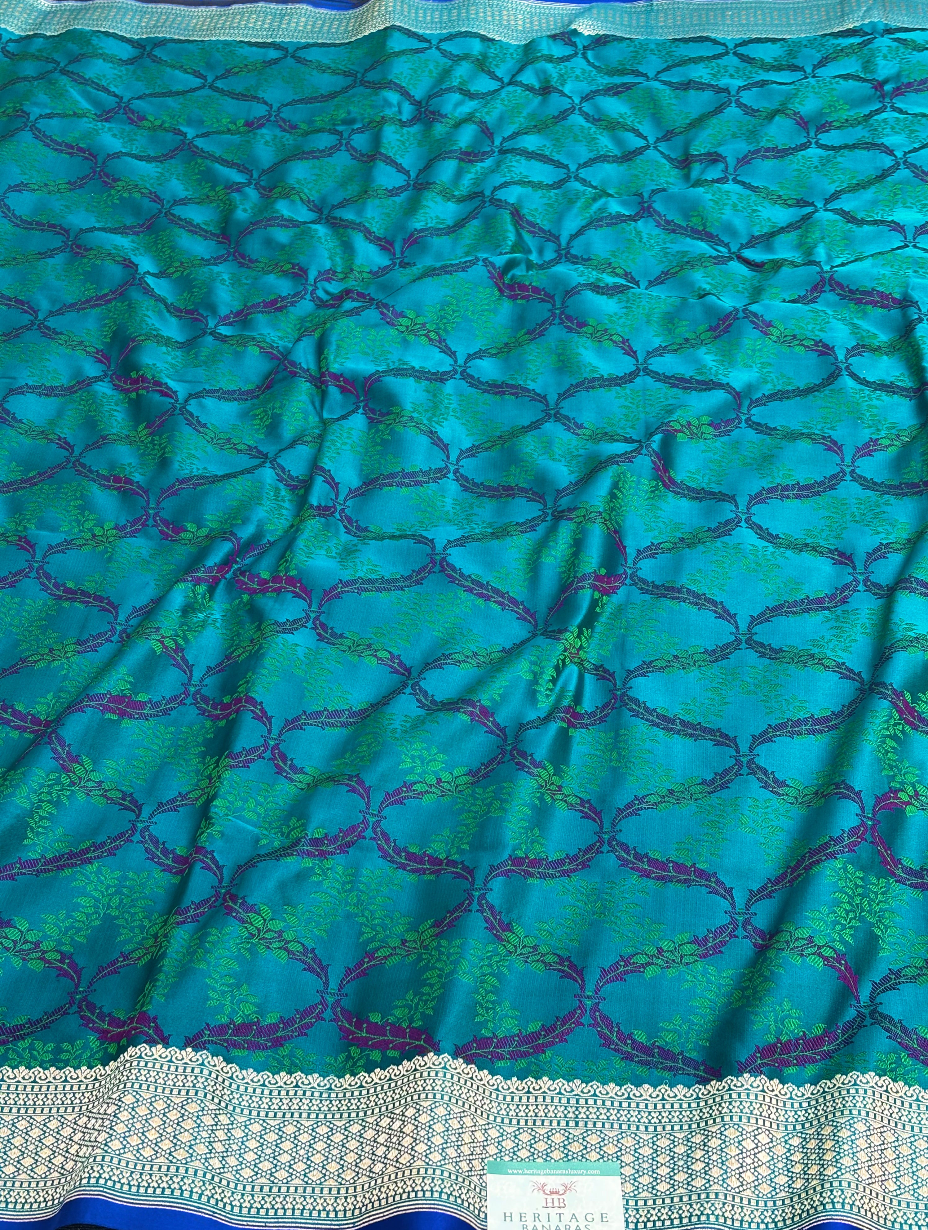 Turquoise Blue Pure Satin Silk Tanchoi Banarasi Saree with Floral Design