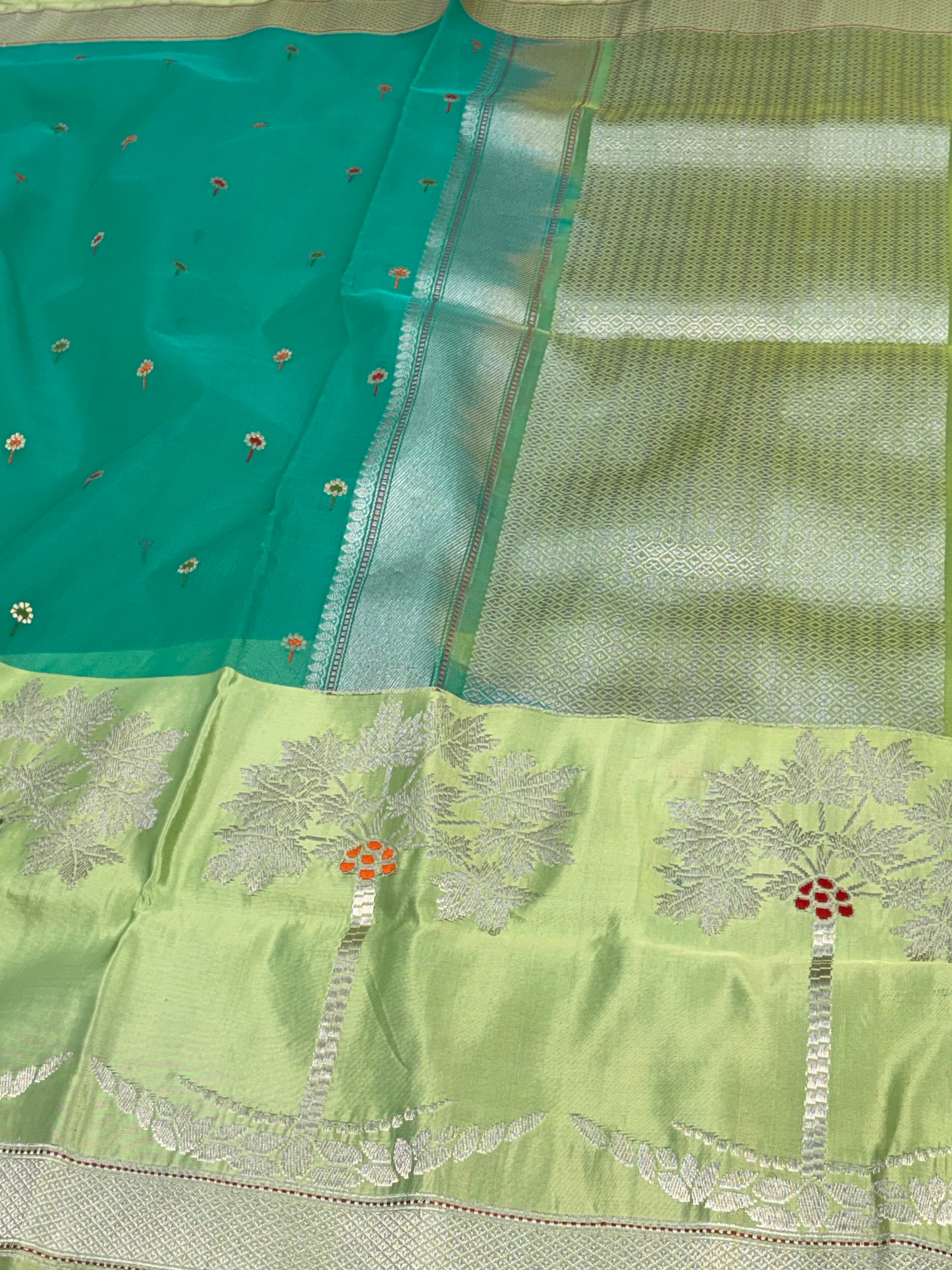 Teal Blue Kora Organza Kadhiyal Banarasi Saree with Artistic Meenakari Border
