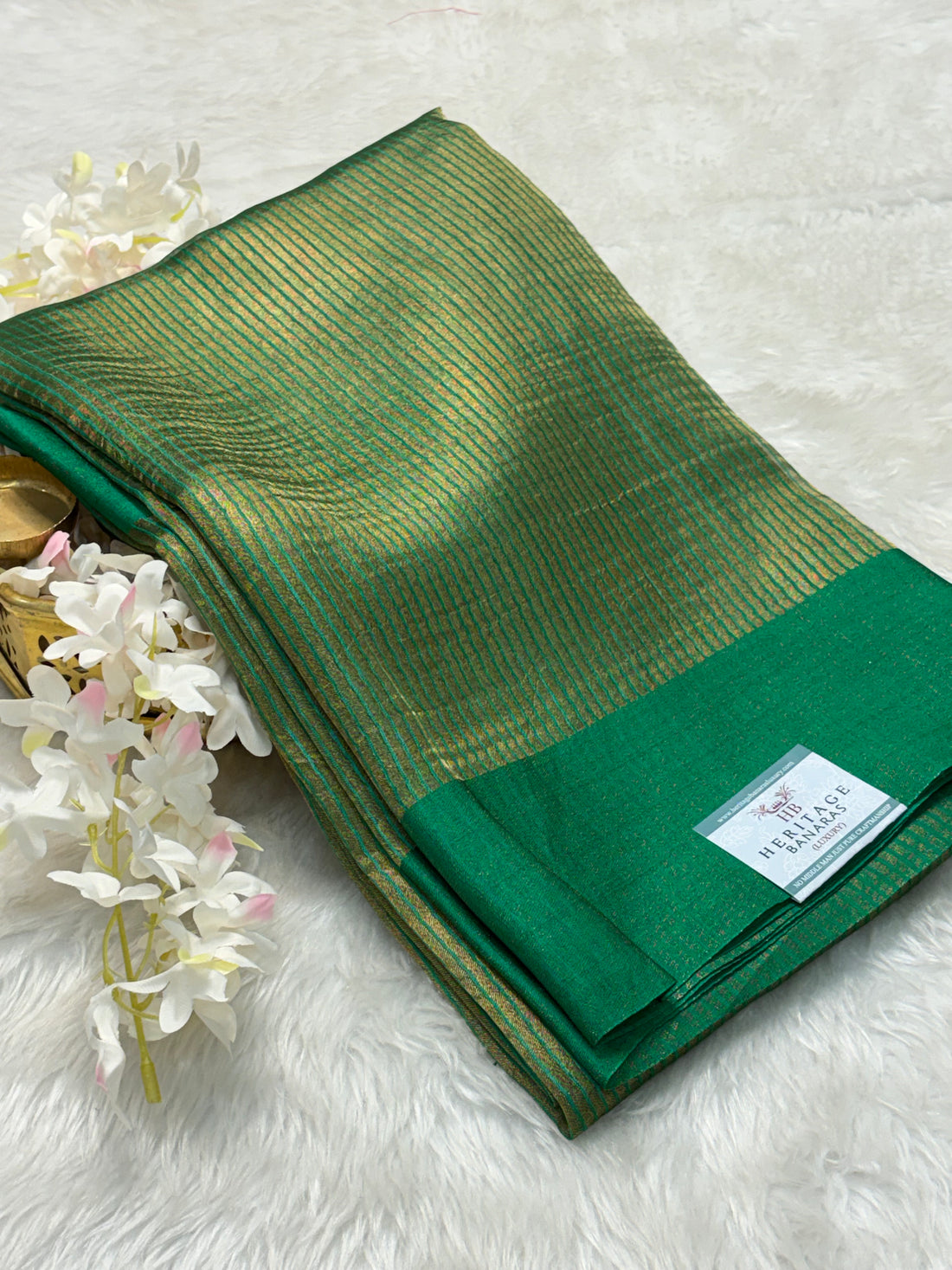 Molten Emerald Green Pure Tissue Banarasi Saree with Satin Katan Silk Border