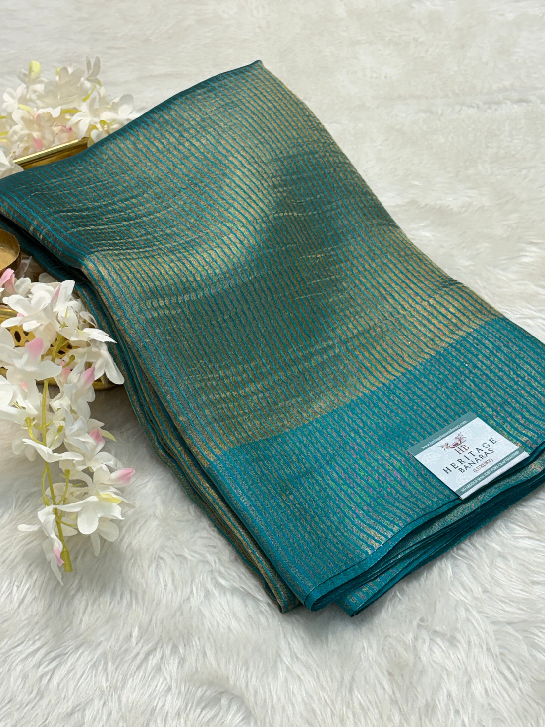 Molten Teal Green Pure Tissue Banarasi Saree with Satin Katan Silk Border