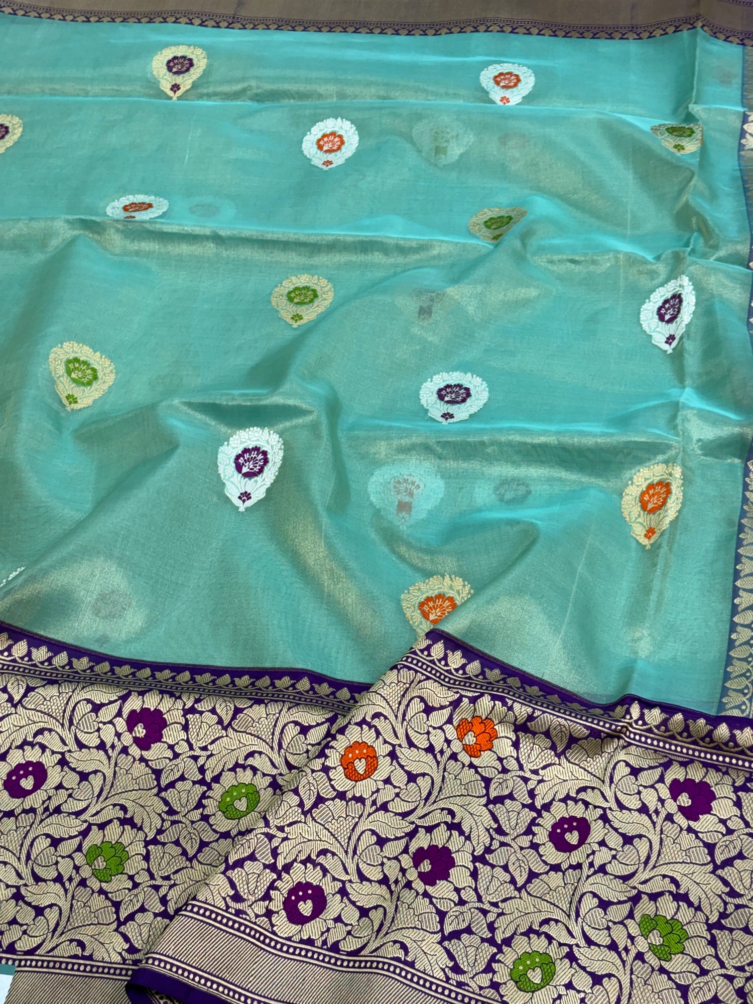 Teal Blue Handwoven Banarasi Tissue Silk Saree with Purple Meenakari Kadhiyal Katan Silk Border