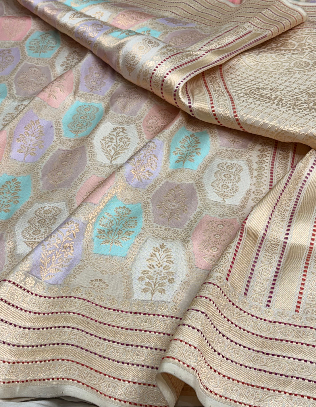 Ivory Handwoven Rangkaat Pure Banarasi Katan Silk Saree with Multicolor Meenakari Motifs