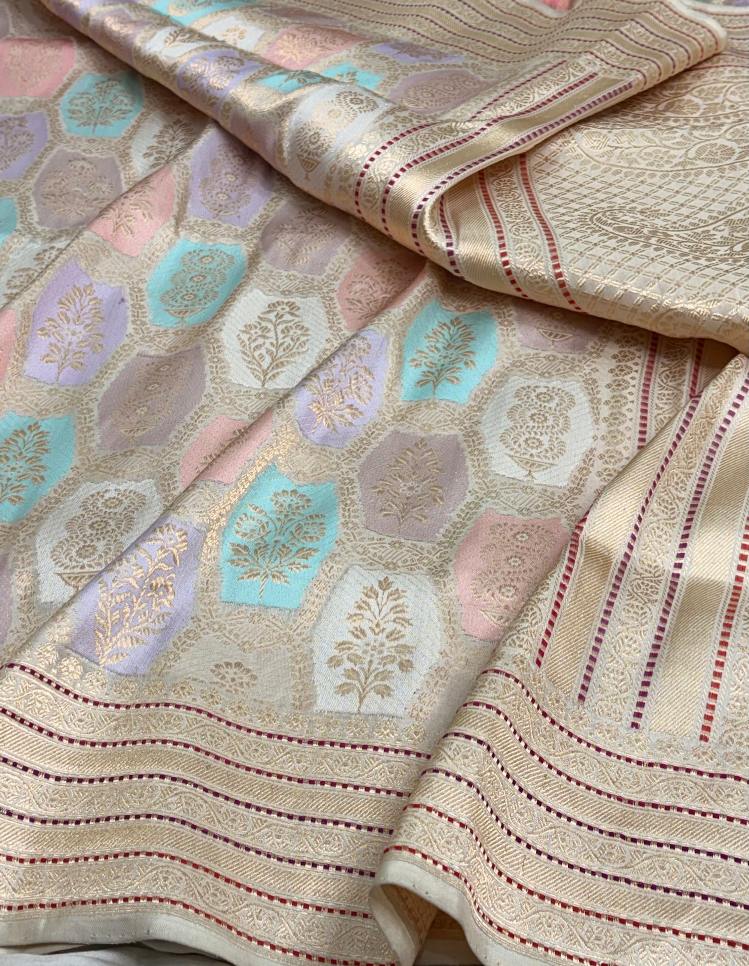 Ivory Handwoven Rangkaat Pure Banarasi Katan Silk Saree with Multicolor Meenakari Motifs