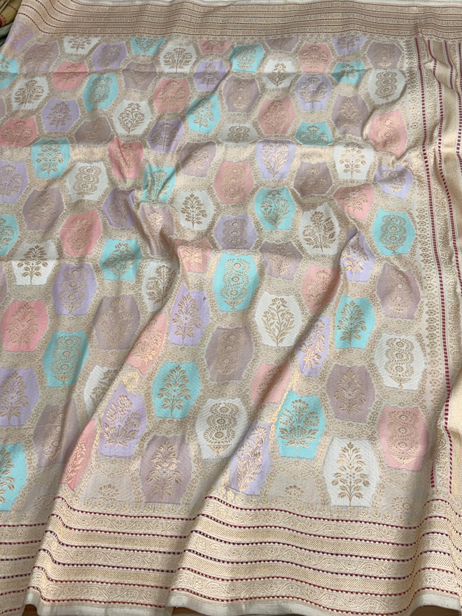 Ivory Handwoven Rangkaat Pure Banarasi Katan Silk Saree with Multicolor Meenakari Motifs