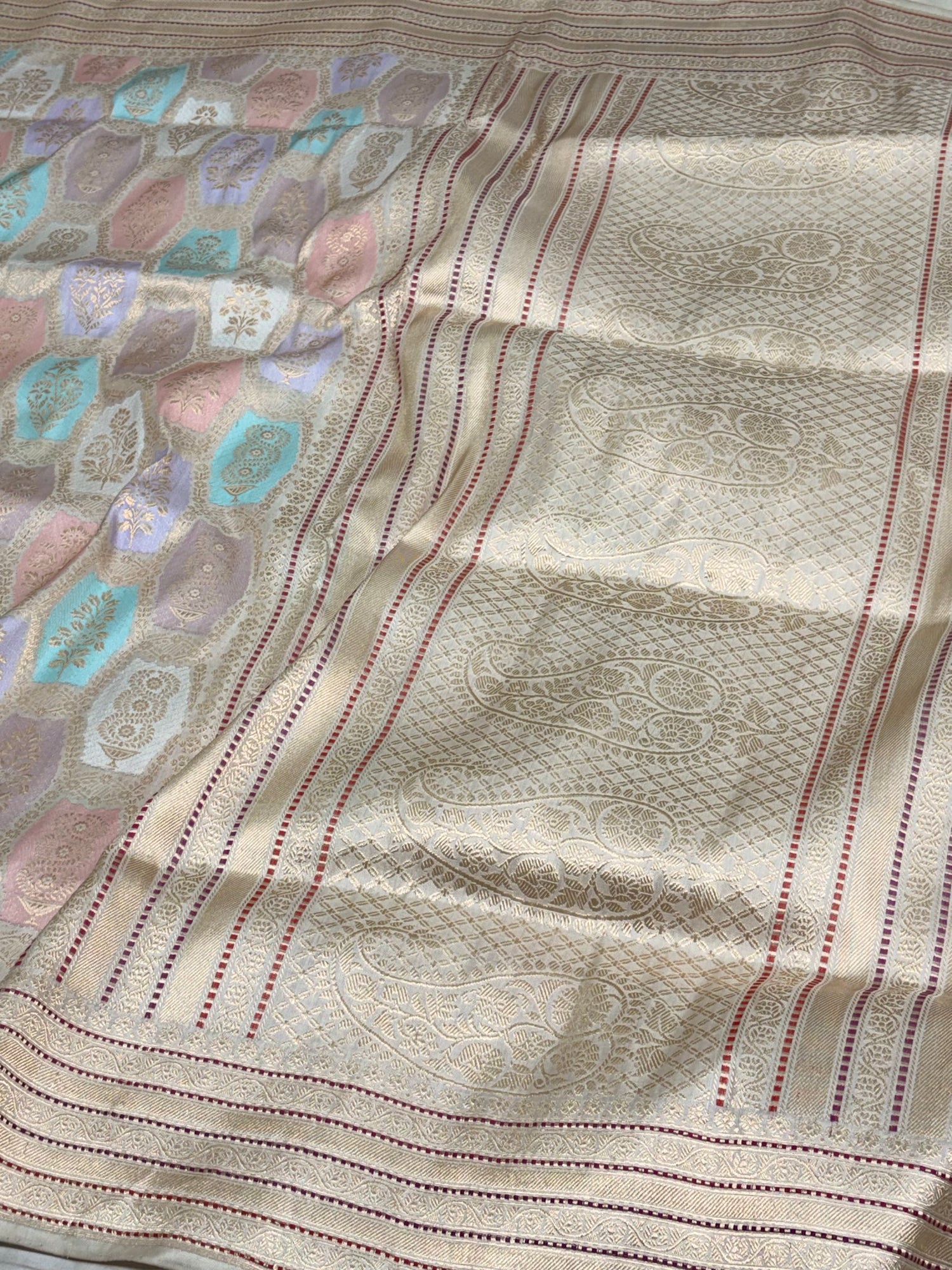 Ivory Handwoven Rangkaat Pure Banarasi Katan Silk Saree with Multicolor Meenakari Motifs