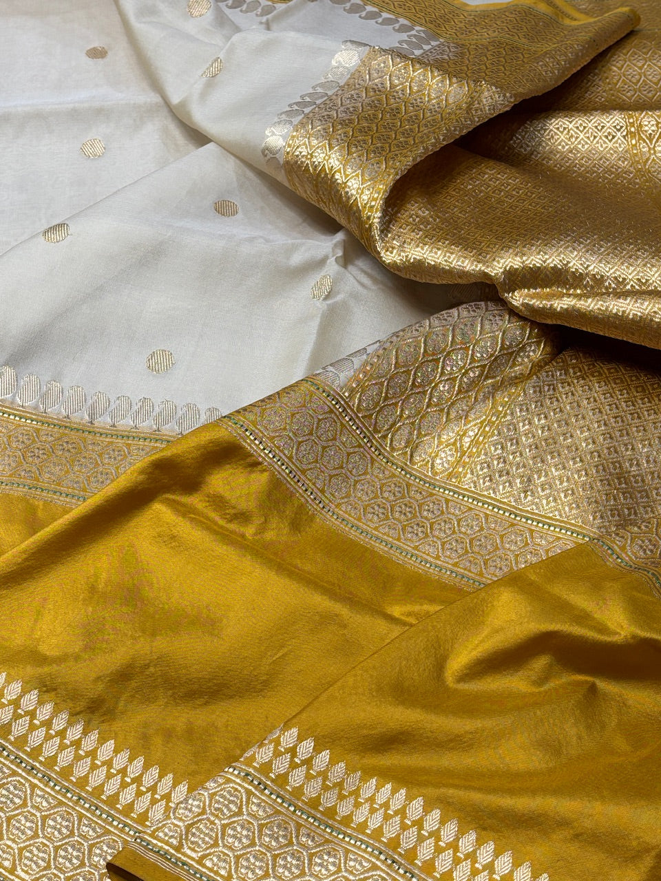 Ivory With Yellow Banarasi Kora Silk Handwoven Saree
