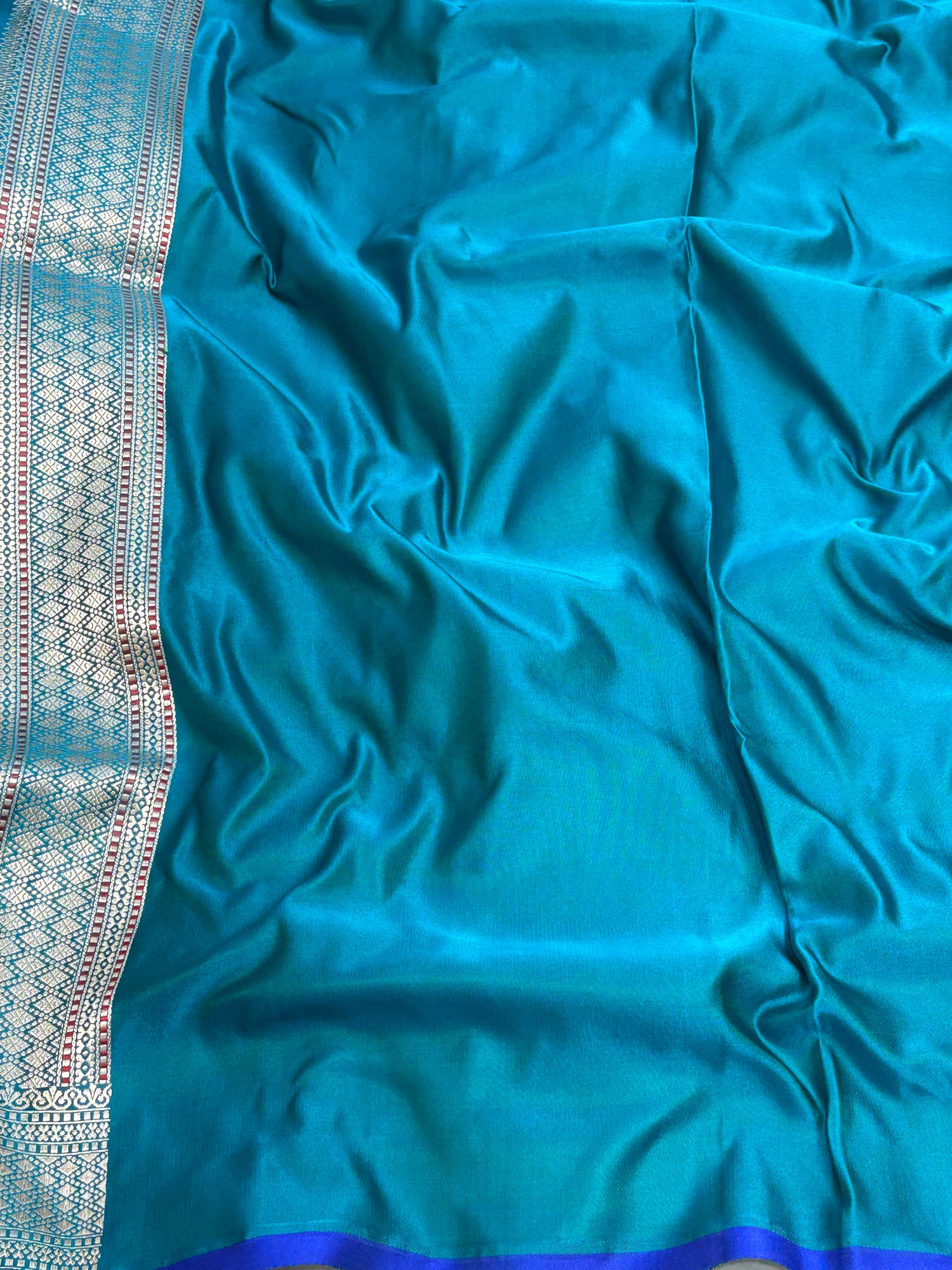 Turquoise Blue Pure Satin Silk Tanchoi Banarasi Saree with Floral Design