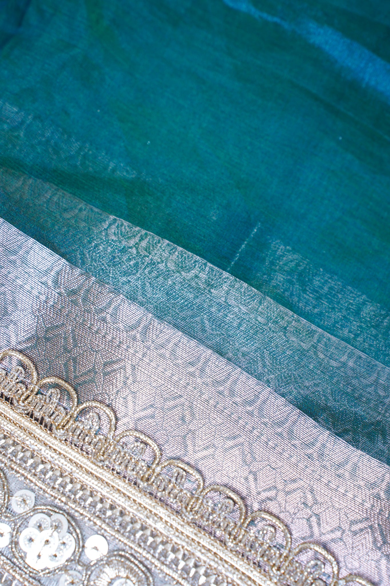 Sea Green Banarasi Pure Tissue Silk Saree with Sequined Lace Border