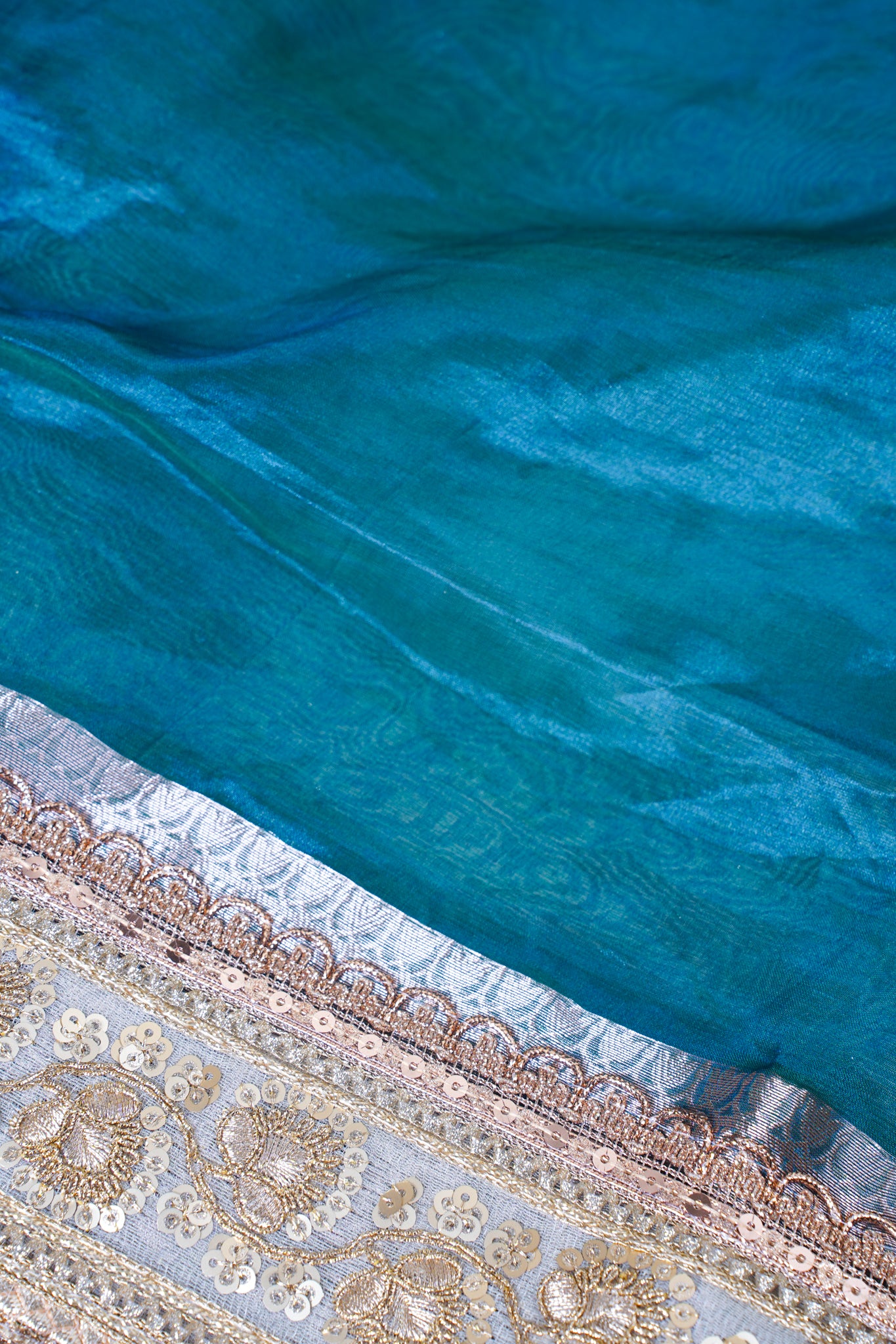 Teal Green Banarasi Pure Tissue Silk Saree with Sequined Lace Border