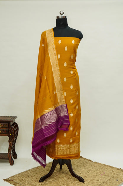 Mustard Handwoven Banarasi Pure Katan Silk Suit with Purple Dupatta